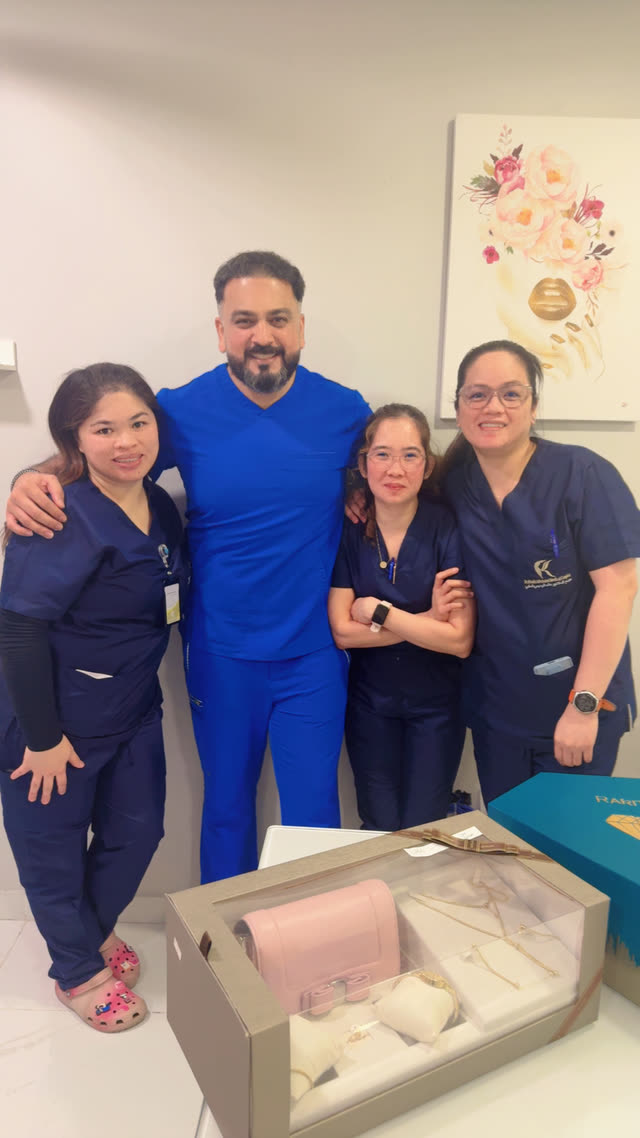 Dr. Usman with his clinic team
