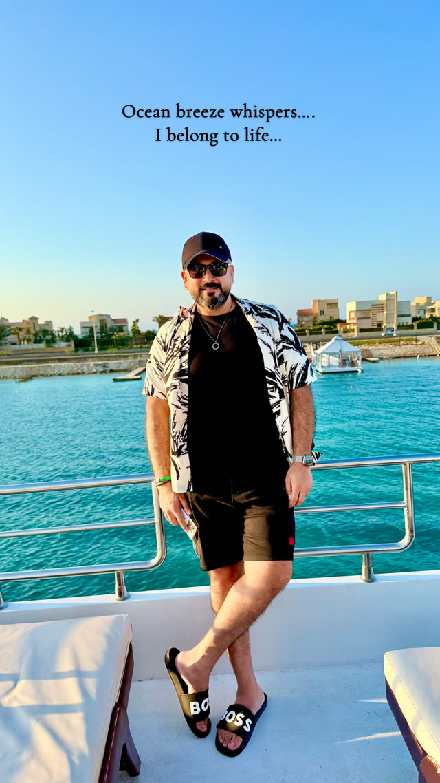 Dr. Usman on a yacht deck